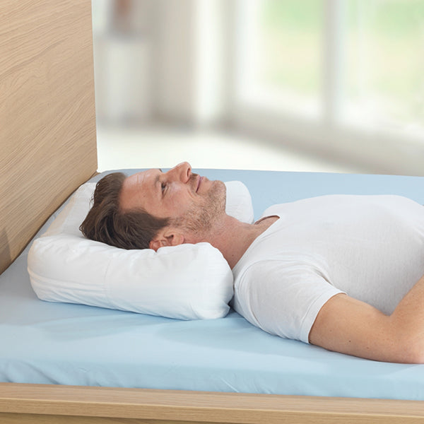 Oreiller pour dormeurs sur le côté avec housse en coton