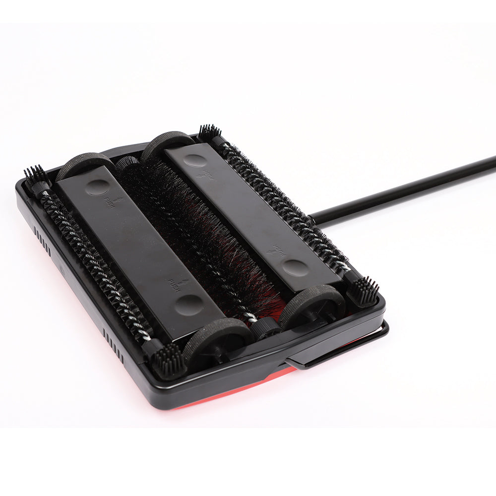 Balai manuel pour tapis, rouge